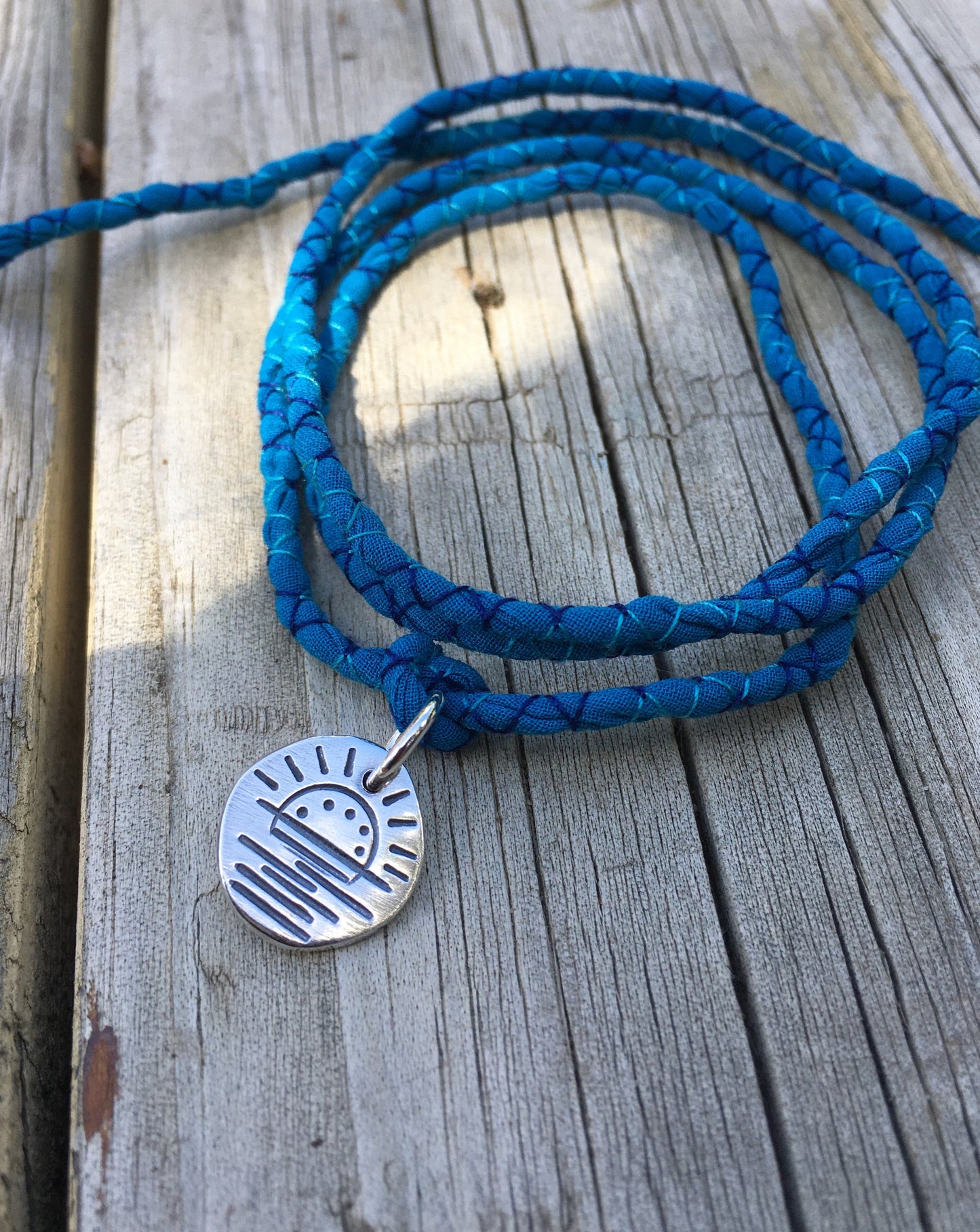 Sunrise charm